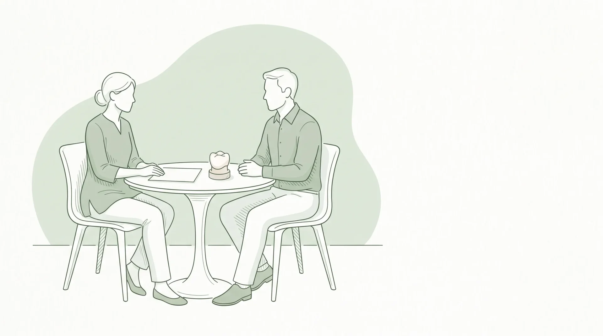 Two adults discuss a dental quote beside a small crown model in a consultation room.